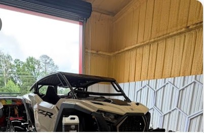 Polaris RZR staged inside the detailing bay
